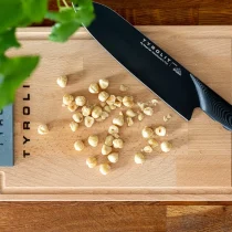 TYROLIT Life Darkline Fly Wheel Cut Nuts on Cutting Board